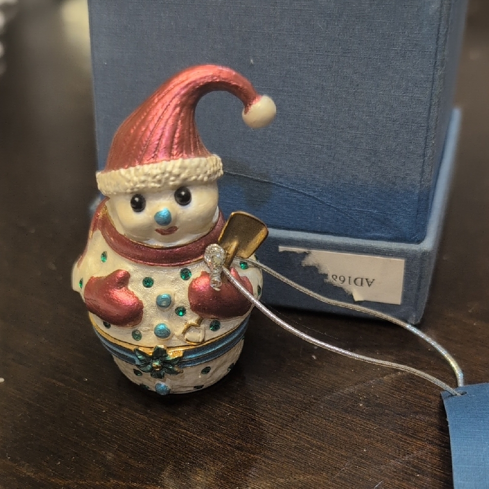 Charming Snowman Ornament with Red Hat and Gold Accents